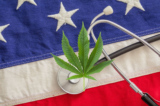 Folha de cannabis, estetoscópio e bandeira dos EUA